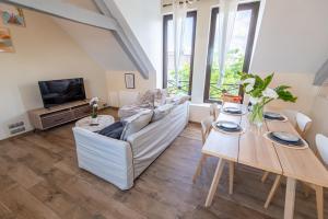 Appartements Loft cosy et lumineux, centre bourg par Groom* : photos des chambres