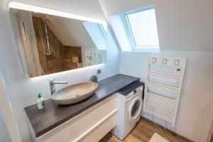 Appartements Loft cosy et lumineux, centre bourg par Groom* : photos des chambres