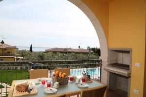 Two-Bedroom Apartment Top with Lake View room in Appartamenti Corte Leonardo