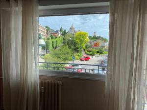 Appartements Au coeur de Lisieux 83 m2 et vue sur la Basilique : photos des chambres