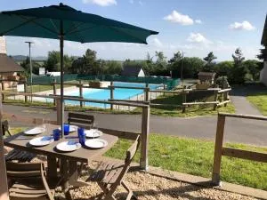 Le chalet de "Lamarmotte" T3 rénové avec terrasse sud en rez de jardin - Vassivière