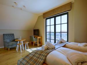 Reetland am Meer - Premium Reetdachvilla mit 3 Schlafzimmern, Sauna und Kamin F23