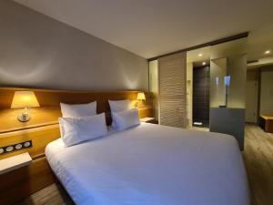 Hotels Maison Jenny Hotel Restaurant & Spa : photos des chambres