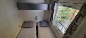 Appartements Mobil-Home 6 pers sur une grande parcelle, piscine, activites, camping 3 etoiles : photos des chambres