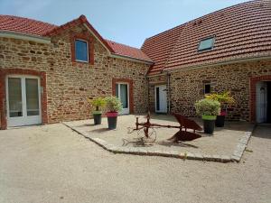 Maisons de vacances La Ferme d' Emerentine : photos des chambres