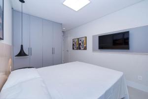Adra 103 - Apartamento no centro de Bombinhas - Rooftop com piscina e academia - À poucos metros da praia - (Consultar serviços de roupas de cama e banho)