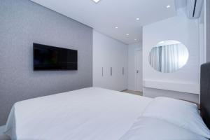 Adra 105 - Apartamento com 3 quartos - Centro de Bombinhas