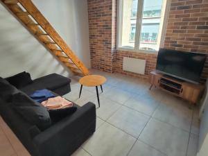 Appartements Joli apparemment type Loft : photos des chambres
