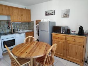 Appartements Studio vue sur lac et montagne : photos des chambres