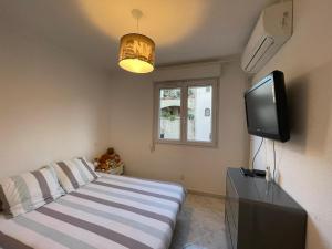 Appartements Appartement T4 tres bien situe et climatise : photos des chambres