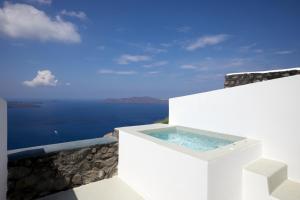 Serenity Suite caldera view with hot tub room in Santorini Princess Spa Hotel