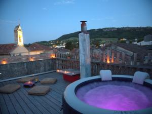 Maisons de vacances Chaleureuse maison avec Jacuzzi : photos des chambres