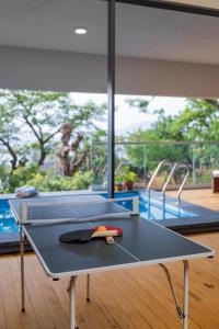 SaffronStays Yahvi Waters by Kosha Villas - 2-BR villa near Pawna Lake with infinity pool and bonfire setup