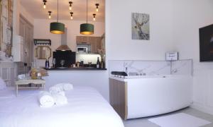 Appartements La Marquise - Cosy Flat - Jacuzzi - Senlis : photos des chambres