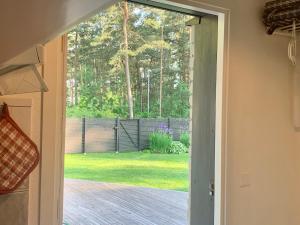 Mysigt boende i Åhus med egen ingång, terass, wifi, tvättmaskin & parkering!