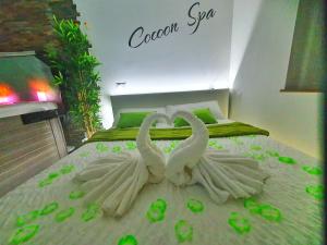 Appartements -GITE COCOON SPA-JACUZZI-JARDIN-PARKING Prive-CLIMATISATION : photos des chambres