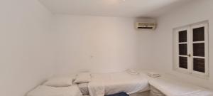 Family Room with Balcony room in Eternal Town Suites