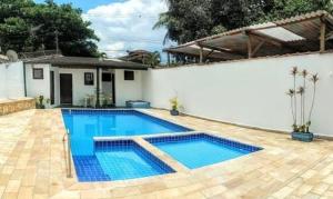 Apto 2 Quartos com piscina e churrasqueira, 5min da Praia do Itaguá