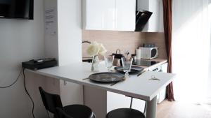 Appartements LITTLE MAMA including a parking space at 100 meters : photos des chambres