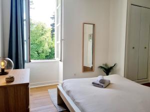 Appartements Confortable T2 sur les rives de la Charente : photos des chambres