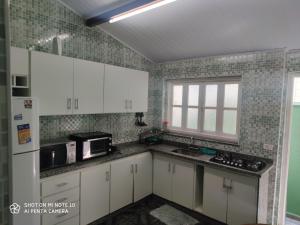 Casa com Piscina Morada da Praia