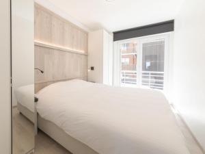 Apartment Spirou met parking by Interhome