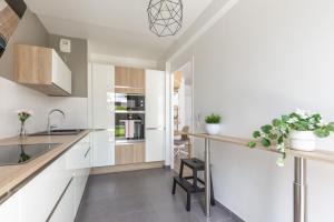 Appartements Sunny Garden by Plaza - Proche Disneyland Paris : photos des chambres