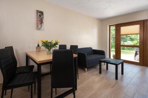 Apartamenty Rodzinne Leśny Zakątek