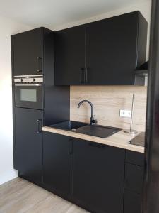 Appartements Elgebar YourHostHelper : photos des chambres