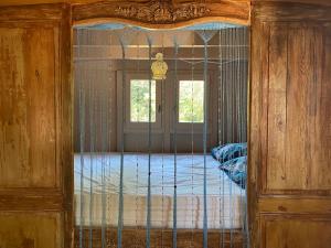 Lodges Les roulottes de Bayama - logement insolite avec jacuzzi : photos des chambres