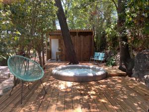 Lodges Les roulottes de Bayama - logement insolite avec jacuzzi : photos des chambres