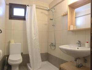 Stone house under a rock Kukos