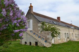 Sejours chez l'habitant Escale a Villeperdue chambre Hellulaug : photos des chambres