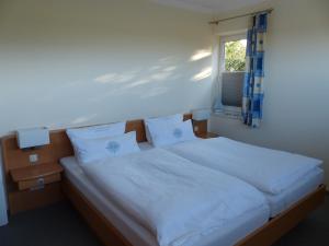 Family Room (2 Adults + 2 Children) room in Strand-Hotel