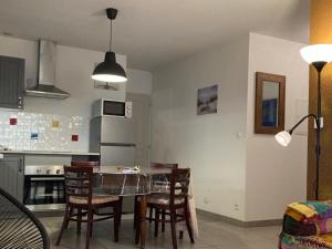 Appartements Les toits de Marseillan : photos des chambres