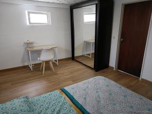 Maisons de vacances Mettez vous au vert pres du chateau de Vaux le Vicomte en sous sol semi enterre : photos des chambres