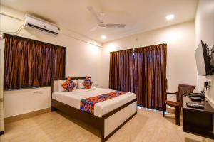 FabHotel Moubani Residency