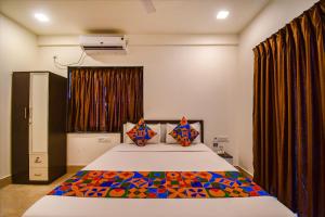 FabHotel Moubani Residency