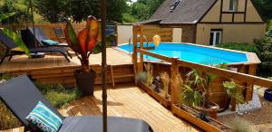 Maisons de vacances Le Vieux Moulin Gites - Detached cottage with garden views and pool : photos des chambres