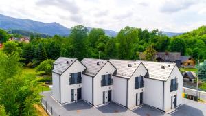 Domki Sikorskiego, Sun & Snow