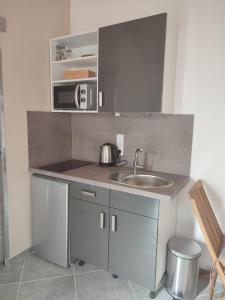 Appartements Jardin de Coubertin : photos des chambres