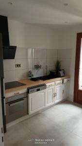 Maisons de vacances Charmante maison de ville avec parking prive : photos des chambres