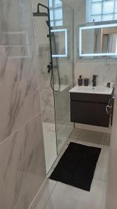 Maisons de vacances Charmante maison de ville avec parking prive : photos des chambres