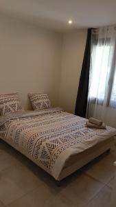 Maisons de vacances Charmante maison de ville avec parking prive : photos des chambres