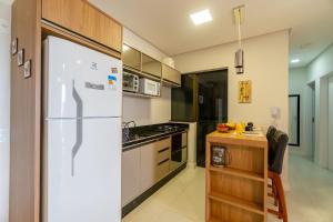 Elegante Apartamento no Centro de Bombinhas, 200m da Praia