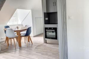 Appartements Le beffroy - vues dominantes sur la mer et le bourg : photos des chambres