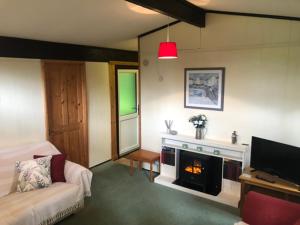 Nuthatch Lodge isin 24 acres of wood, parkland near the village of Cenarth