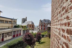 Appartements La bellevue - vue plongeante sur la mer sous les charpentes : photos des chambres