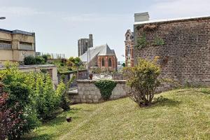 Appartements La bellevue - vue plongeante sur la mer sous les charpentes : photos des chambres