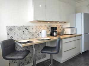 Appartements Le Thourottois*Centre ville*Wifi*Spacieux*Confort* Saint-Gobain : photos des chambres